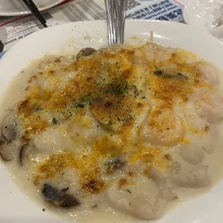 DWR11. Baked Seafood in Cream Sauce ()