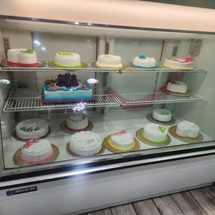 a display case of cakes