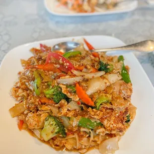 a plate of stir fried vegetables