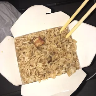 a box of rice and chopsticks