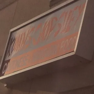 a sign on the side of a building