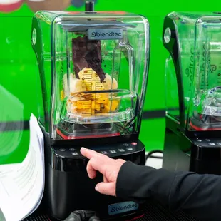 a person using a blender