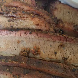 I'm just gonna go ahrad and say this... BEST brisket in Texas! Take note of the smoke ring and the nice spicy crust.