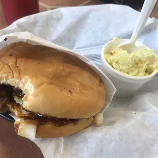 a hamburger and coleslaw