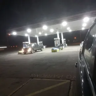 a gas station at night