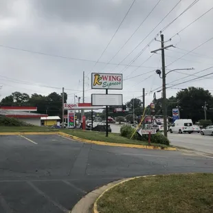 a view of a fast food restaurant from across the street