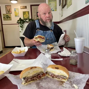 My husband enjoying his bacon cheddar burger combo.