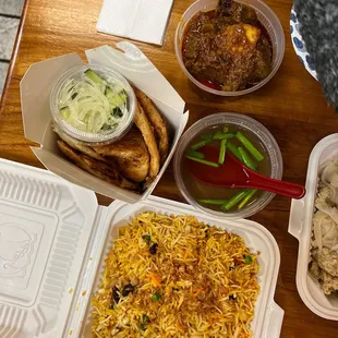 Paratha with Beef Curry and side of yellow rice