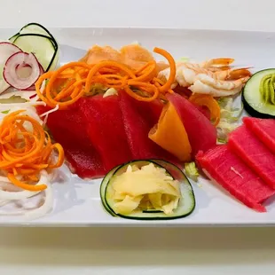 a variety of vegetables on a white plate