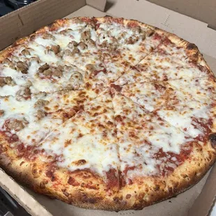 Build your own pizza. Half sausages half cheese.