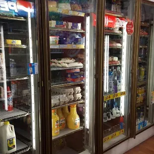 a row of refrigerators in a store