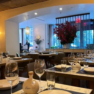 a restaurant with tables and chairs