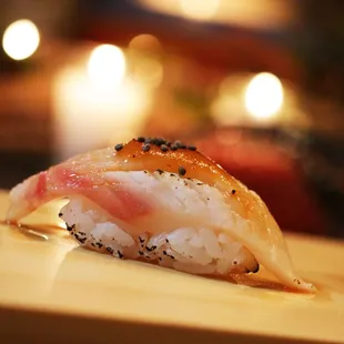 a close up of a piece of sushi