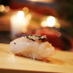 a close up of a piece of sushi