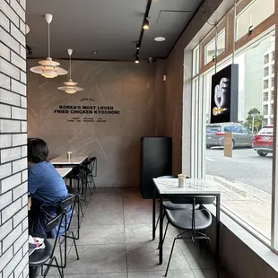 a woman sitting at a table