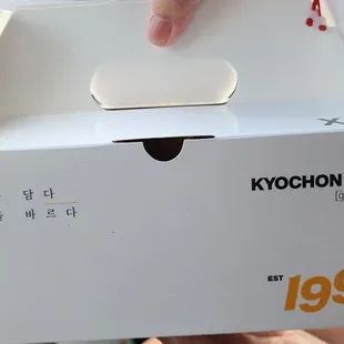 a person opening a box