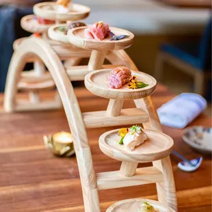 a display of various types of sushi