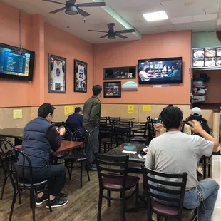 Seating area with two TVs
