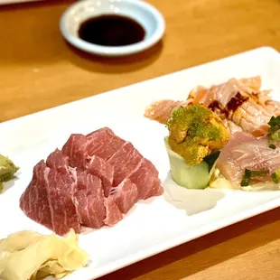 Tuna belly Toro, torched salmon, lemon fish