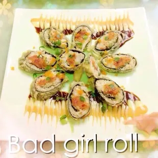 a plate of sushi rolls on a table