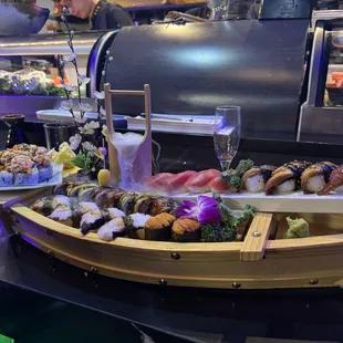 Tuna sushi,tuna sashimi,octopus,dragon roll,eel,volcano,uni