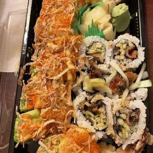 Shrimp topped with scallops and eel roll