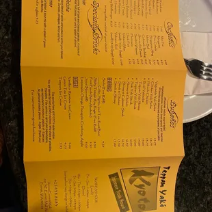 a menu and a fork