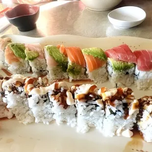 Spider roll and rainbow roll, along with ginger and wasabi