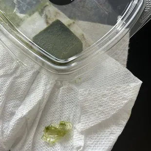 Plastic bag debris in matcha chocolate