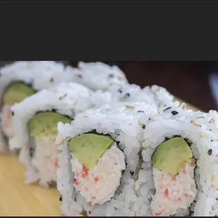 a sushi roll with avocado