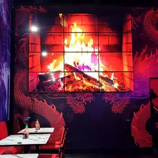 Huge virtual fireplace towards the back. Very inviting.