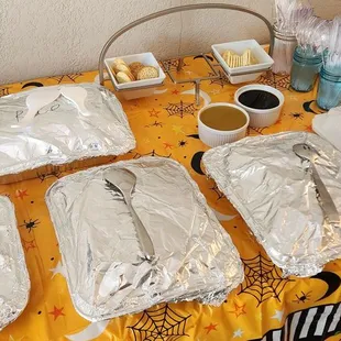 Catering. Small trays. Teriyaki sauce and curry sauce in the ramekins