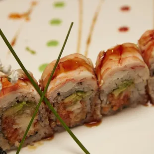 a closeup of a sushi roll on a plate