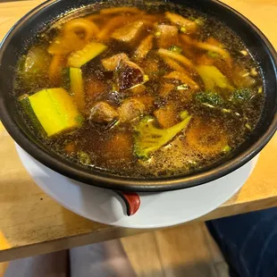 a bowl of hot and sour soup