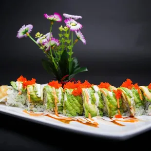 a plate of sushi and ramen