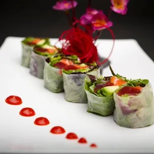 a row of sushi rolls