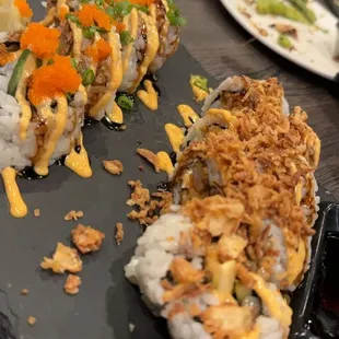 a sushi bar with a variety of sushi