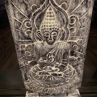 a drawing of a buddha