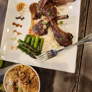 New Zealand lamb entree with asparagus and fried rice