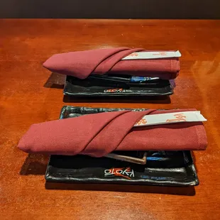 Chopsticks, napkins, plates, and soy sauce dippers