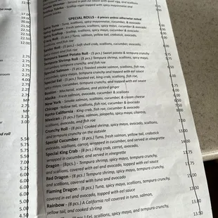 Menu with prices crossed off, crinkled. Just poor presentation and aesthetics for the restaurant. (5/21/2023)