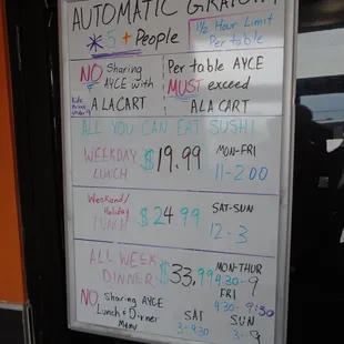 Menu board with specials inside the entryway.