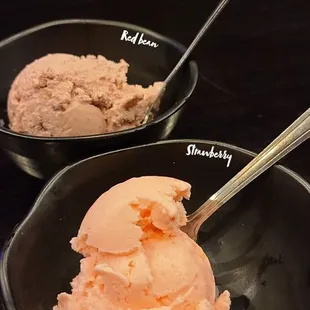 two bowls of ice cream with spoons