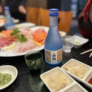 a bottle of sake on a table