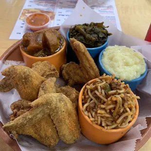 Fried Wings meal with your choice of four sides! I had grits, candied sweet potatoes (so good), spaghetti and collard greens.