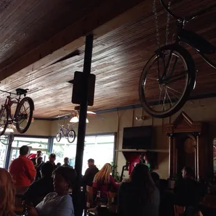 Word is this shop use to be a bicycle shop so they hang up some as decor.