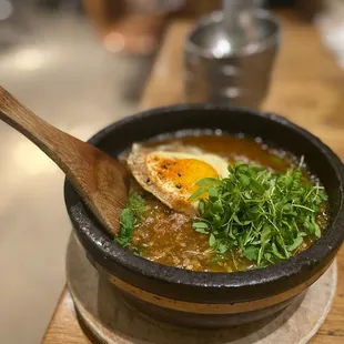 THAI FRIED RICE STONE POT with fried egg
