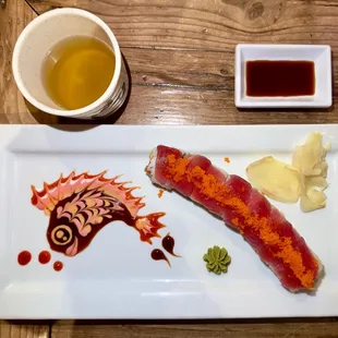 a plate of food and a cup of tea