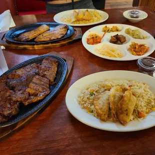 Spicy beef bulogi &amp; chicken in the background