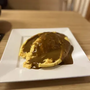 Curry sauce on omurice